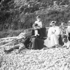 Family group on Newgale beach, Pembrokeshire, West Wales