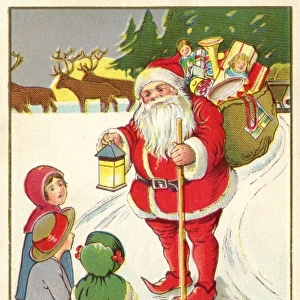 Father Christmas meets three little children out in the snow
