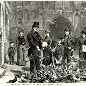 Feeding pigeons in the Guildhall Yard, City of London 1877