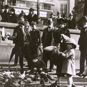 Feeding the pigeons, Trafalgar Square, London
