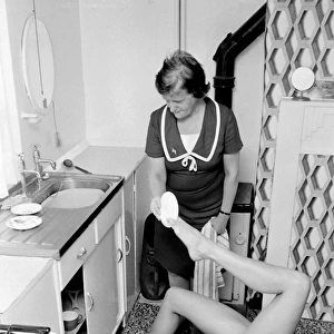 Female contortionist Diana Gaye washing up