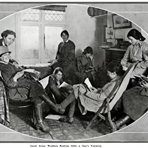 Female land army workers resting after a full day 1918