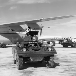 A Ferret armoured scout car at Belize with a RAF Short SC-5