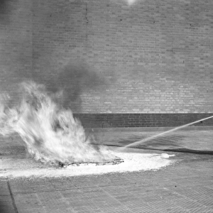 Firefighter training with foam extinguisher