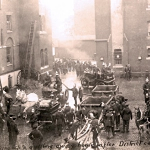 Firefighters and appliances at headquarters