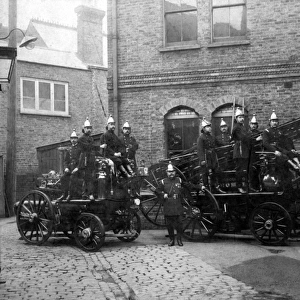Firefighters with two fire engines