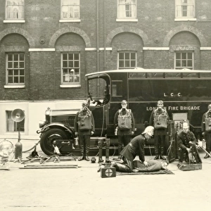 Firefighters with one of the first emergency tenders