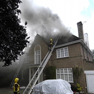 Firefighters respond to a house fire, North London