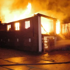 Firefighters at scene of fire, Chesterfield Way, SE15