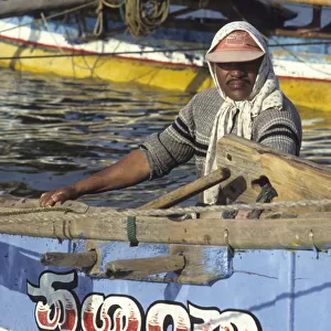 Fisherman in headscarf, Sri Lanka