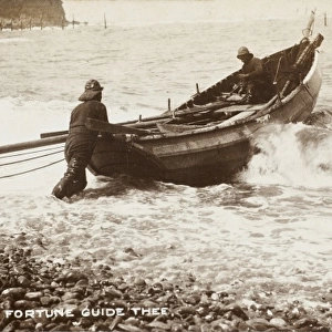 Fishermen pushing off from the shore