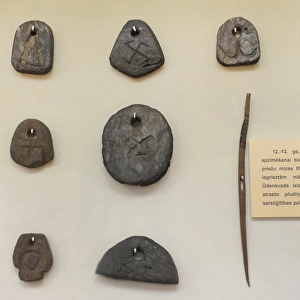 Fishing accessories. 12th-13th centuries. Museum of History