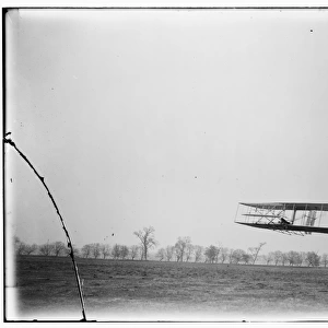 Flight 85: Orville in flight over treetops, covering a dista