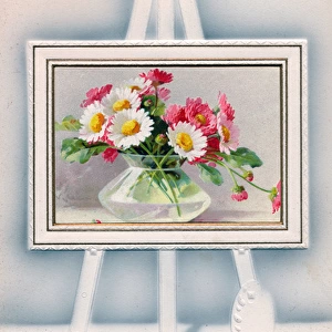 Flowers in a vase on an easel on a birthday postcard