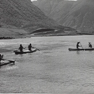 French scouts canoeing during a camping trip