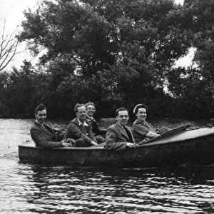 Five Friends in a very small motor boat on the River Thames