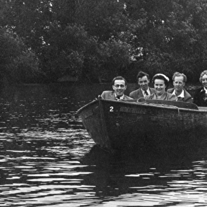 Five Friends in a very small motor boat on the River Thames