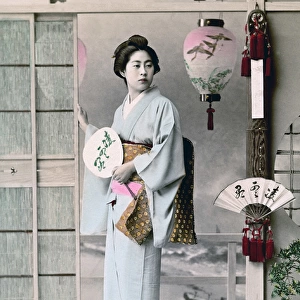 Geisha with fan, Japan, circa 1890