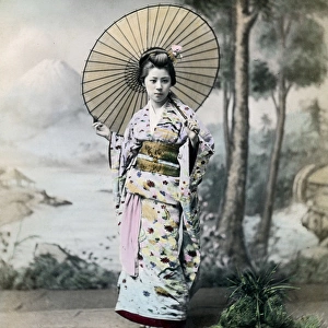Geisha with parasol, Japan, circa 1880s