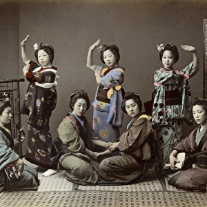 Geishas dancing and playing music, Japan