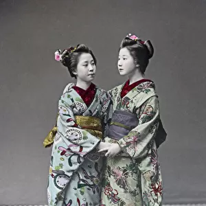 Geishas with ornate kimonos, Japan, circa 1880s. Date: circa 1880s