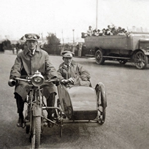 Two gentleman on a 1908 / 9 veteran motorcycle & sidecar