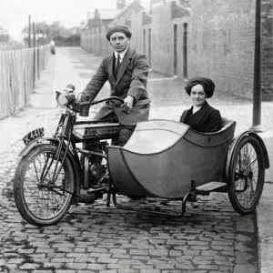 Gentleman & lady on 1920 Rudge Multi motorcycle & sidecar