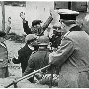 German soldiers rounding up Polish civilians, Sept 1939