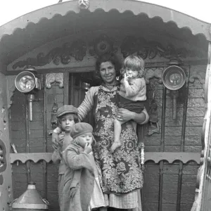 Gipsy woman with three children