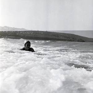 Girl in the Cornish surf