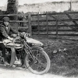 Girl & dog on a 1921 Triumph SD motorcycle & sidecar