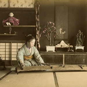 Girl playing musical instrument