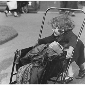 Girl with Pushchair