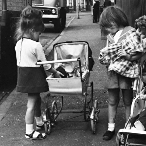 Girls with dolls and prams, Balham, SW London