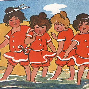 Girls padding in the sea
