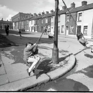 Girls playing in Milton Street, Belfast, Northern Ireland