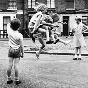 Girls skipping on a Balham street, SW London