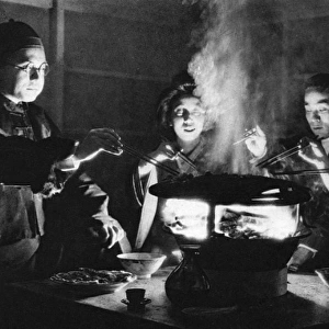 A group of Japanese people enjoying a meal