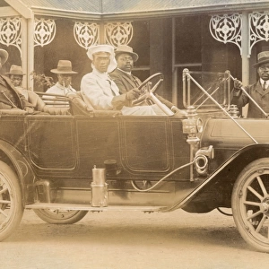 Group of men in a motor car, West or South Africa
