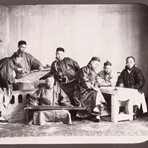 Group of seated Chinese men, musician, China