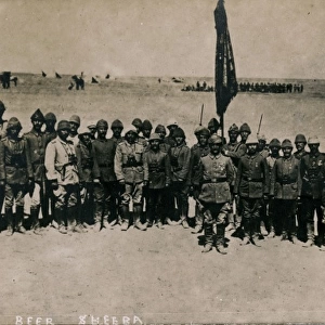 Group of soldiers with flag, Beersheba, Middle East