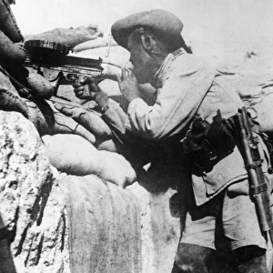 Gurkha firing Lewis gun in trenches, WW1