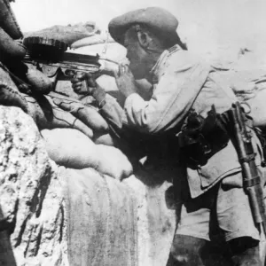 Gurkha firing Lewis gun in trenches, WW1