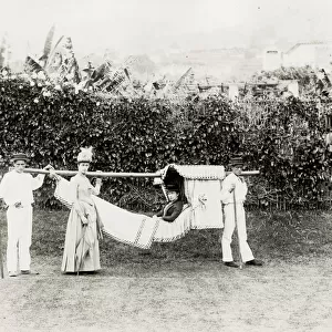A hammock, carrying chair, likely Madeira or Canary Islands