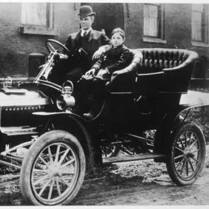 Henry Ford and son Edsel in a 1905 Ford Model F