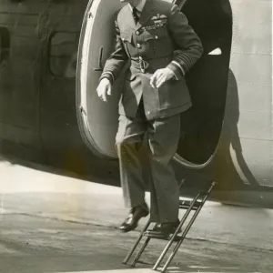 HM King George VI (in RAF uniform) leaves a de Havilland