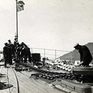 HMS Dunedin, British light cruiser, with crew