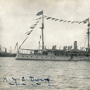 HMS Dwarf at sea with flags flying