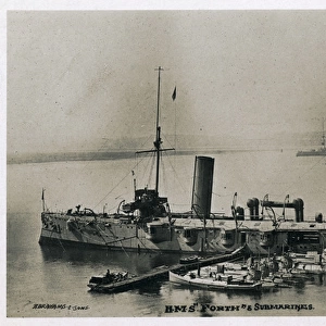 HMS Forth in Devonport with submarines