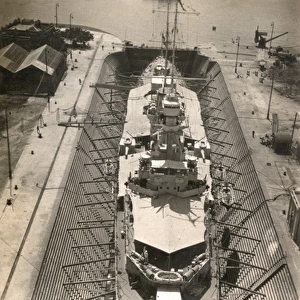 HMS Frobisher, British heavy cruiser, in dry dock